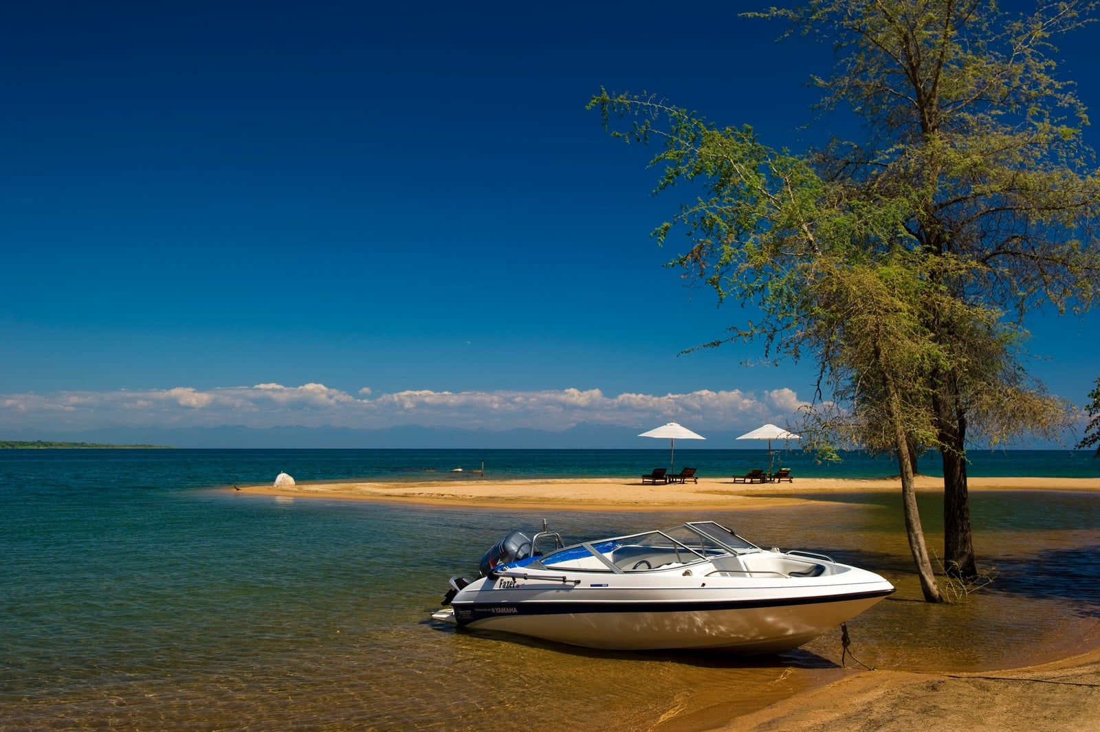 Pumulani Lodge Pumulani Lodge: Boot am Strand
