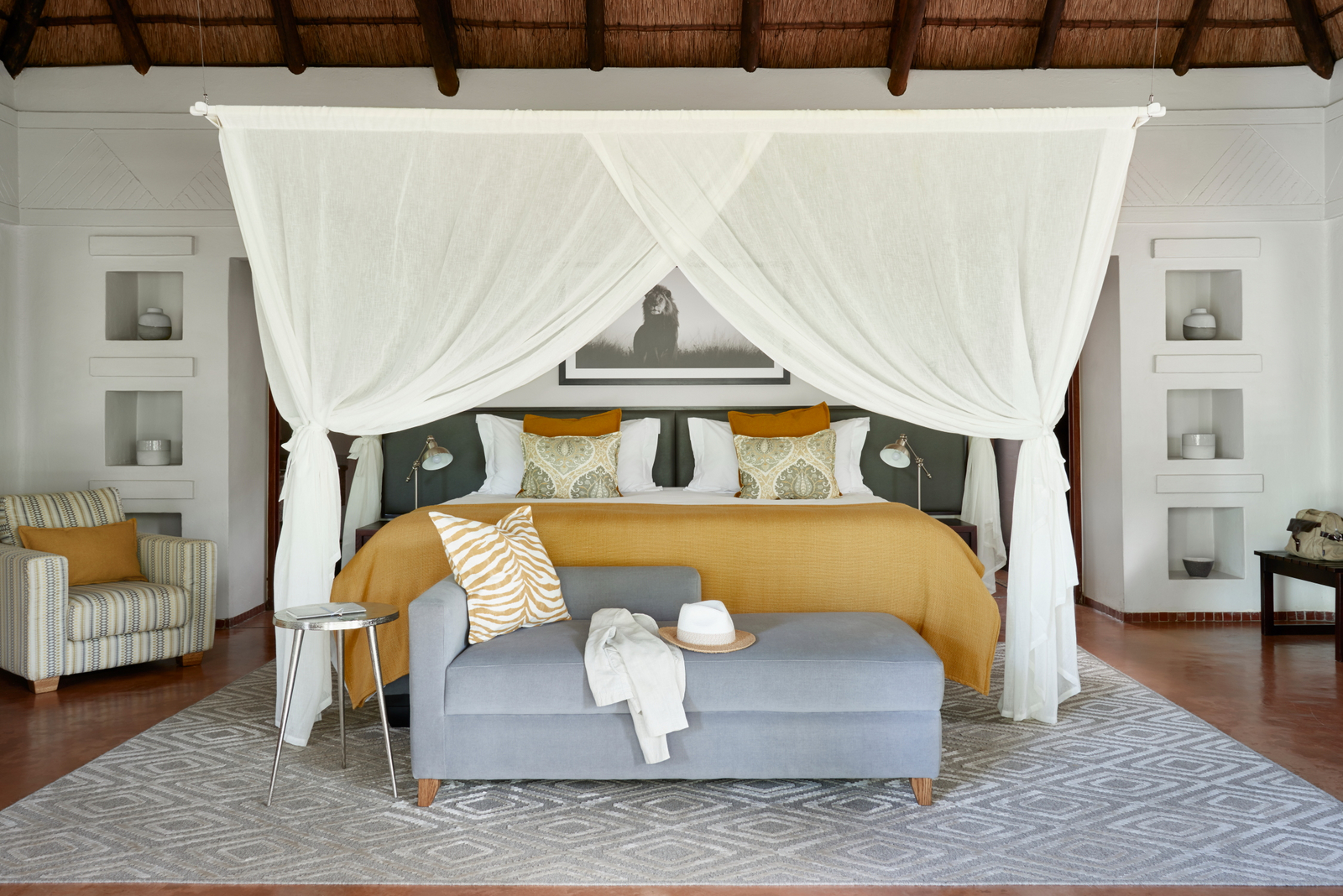 Sanctuary Chobe Chilwero Sanctuary Chobe Chilwero: Doppelbett mit Moskitonetz